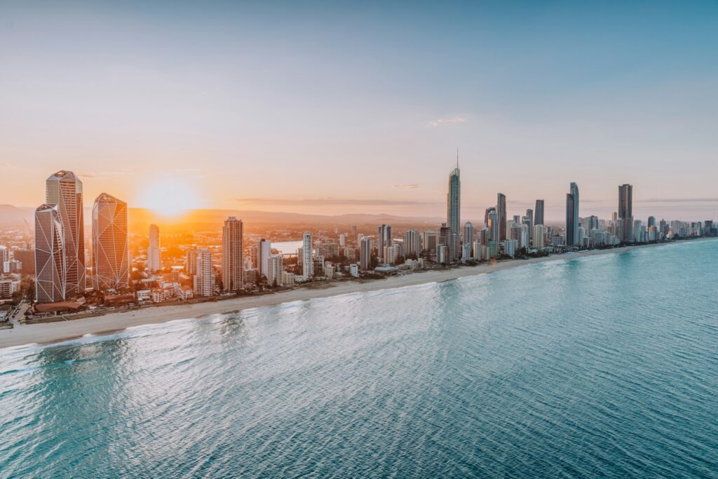 An aerial view of a city and a body of water