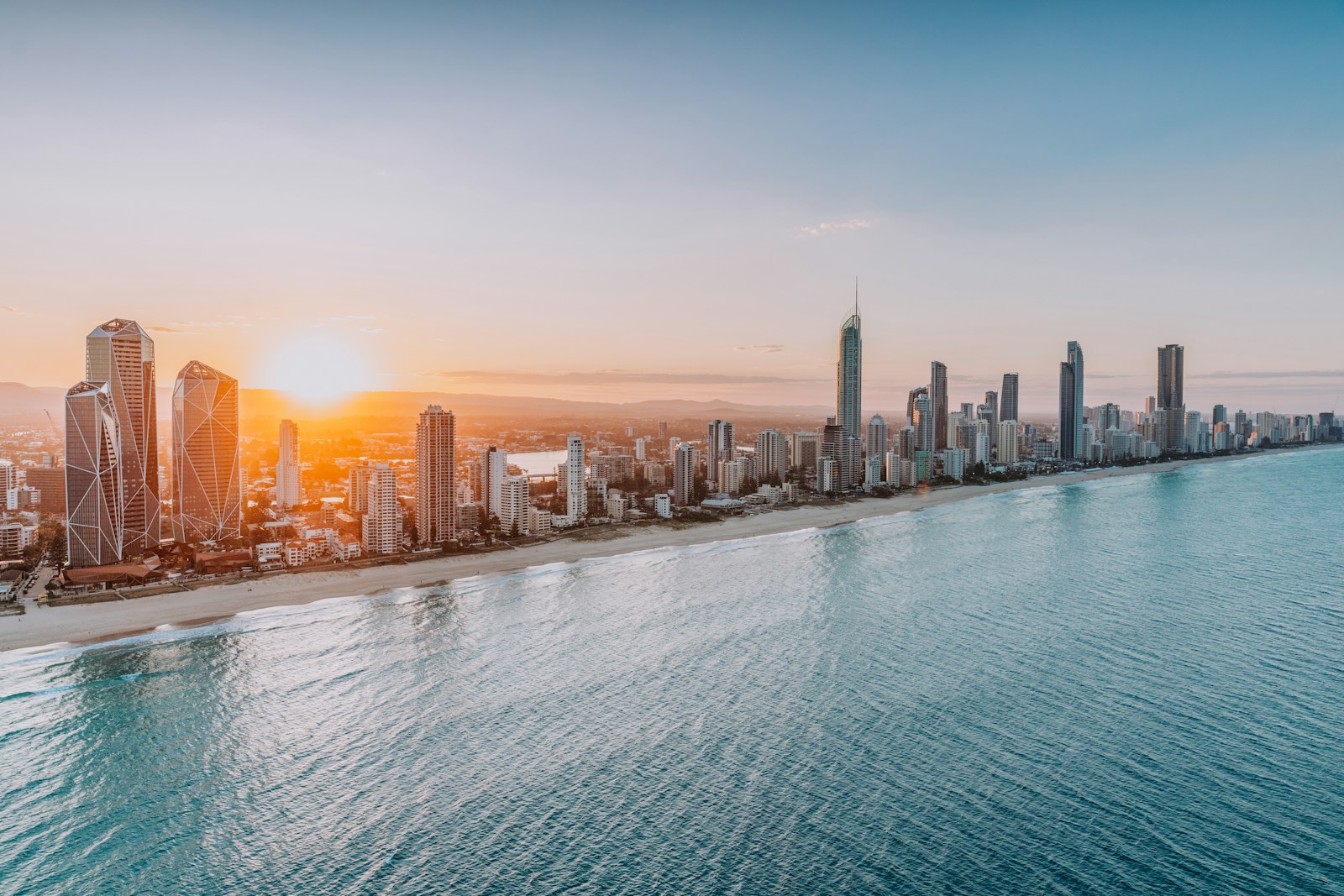 An aerial view of a city and a body of water